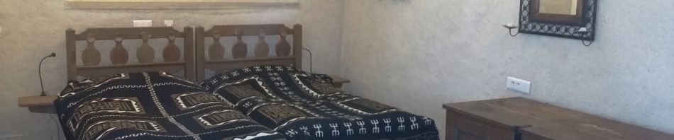 Les lits jumeaux de la chambre terrasse